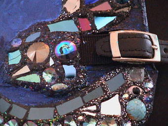 Close up of the straps and mosaic on the front of the brace