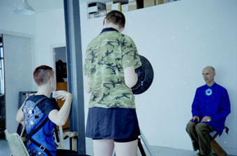Photo of Melanie Manchot taking Andrew Logan's portrait