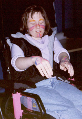 Performing arts students experiment with fluorescent body paint