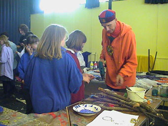 Photo of Andrew Logan working with school students