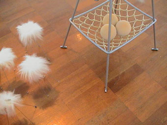 Close up of bottom of stool and balls