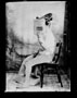Edwardian photo of prosthetic user with prosthesis removed from the picture