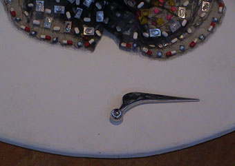 Photo of artificial hip joint at bottom of exhibit