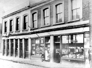 Black and white photograph of shops