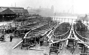 Black and white photograph of ship-building
