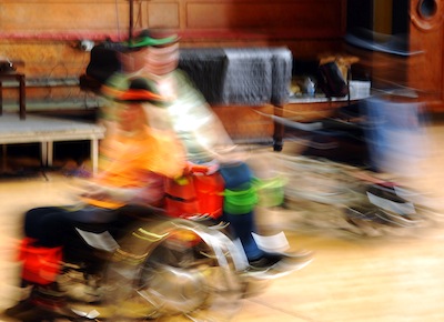 Blurred colour photograph of dancers spinning round