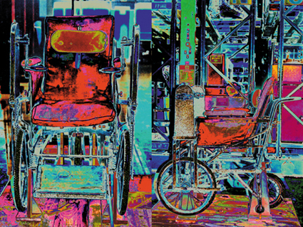 This is a colour photograph of old-fashioned wheelchairs in the Science Museum stores, digitally manipulated so that they glow with bright colours.